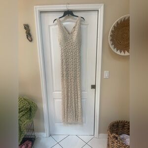 Size 7/8 new with tags lace ivory/beige dress.